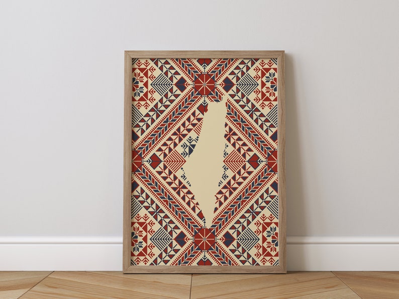 May include: A framed print featuring a beige background with a red, blue, and white geometric pattern. The pattern is in the shape of a diamond and the outline of Jordan is cut out of the center.