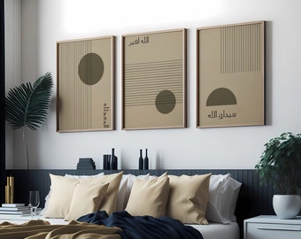 May include: Three framed prints featuring geometric shapes and Arabic text. The prints are in shades of brown and beige and are hung on a white wall above a bed with beige pillows.