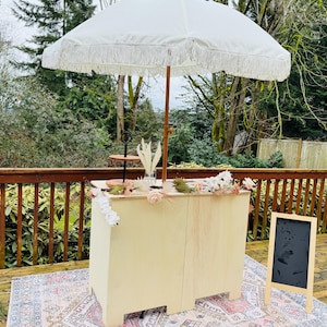Folding charcuterie cart with customizable top .Natural finish sanded ready for stain or paint.