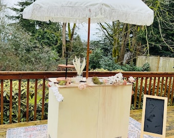Folding charcuterie cart with customizable top .Natural finish sanded ready for stain or paint.