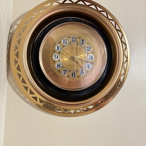 Gold and Black Modern clock