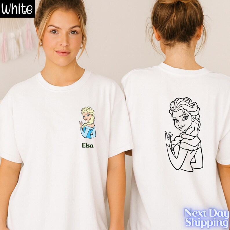 A woman wearing a white t-shirt with a cartoon image of a blonde woman and the name 'Elisa' printed on it.