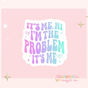 May include: A sticker with a rainbow gradient design featuring the text "It's me, hi I'm the problem it's me" with hearts and stars.