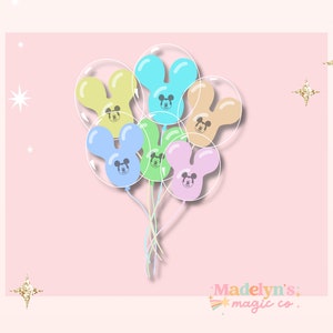 May include: A bunch of pastel colored balloons with Mickey Mouse ears and faces. The balloons are tied together and have a pink background.