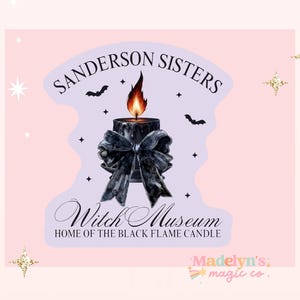 May include: A purple and white sticker with a black candle with a black bow and a black flame. The sticker says "Sanderson Sisters Witch Museum Home of the Black Flame Candle" and "Madelyn's magic co."