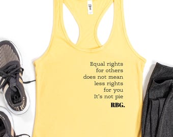 May include: A yellow tank top with the text "Equal rights for others does not mean less rights for you. It's not pie. RBG." is displayed with a pair of black and tan sneakers and dark gray leggings on a white background.