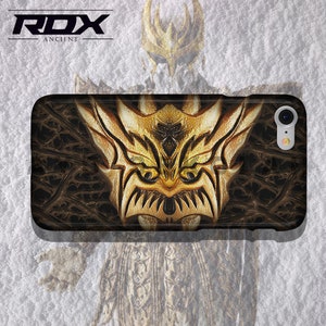 May include: A black phone case with a gold dragon design. The dragon has sharp teeth and claws. The case has a textured background.