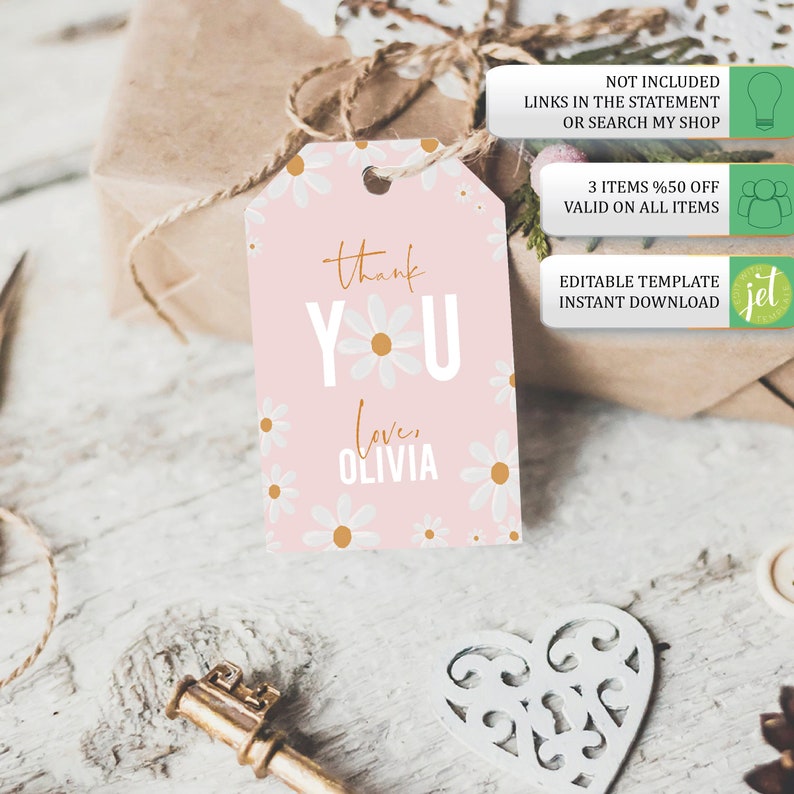 May include: Pink thank you gift tag with white daisies and gold accents. The tag says "Thank You" with a daisy in the "O" and "loves Olivia" below.