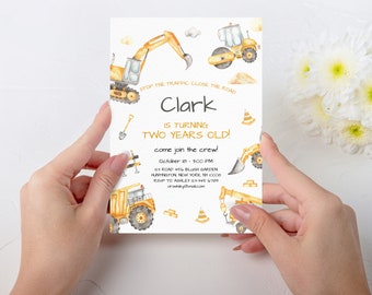 May include: Construction themed birthday party invitation with a yellow excavator, a yellow dump truck, and a yellow road roller. The invitation says "Stop the traffic close the road" and "Clark is turning two years old!" with a date and time for the party.