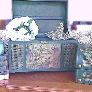 Pair of exotic vintage decorative boxes, green stained wood, wicker, bamboo and leather with bronze hardware and felt lining.
