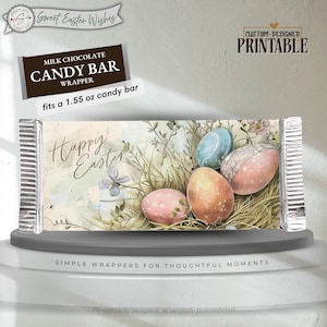 Può includere: Confezione di barretta di cioccolato al latte a tema pasquale. La confezione presenta la scritta «Buona Pasqua» e illustrazioni di uova decorate ed elementi floreali. La confezione è per una barretta di cioccolato da 43,9 grammi.