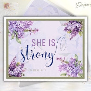 May include: A greeting card with a floral design and the words "SHE IS strong" in a script font. The card features watercolor illustrations of purple lilacs and the text "PROVERBS 31:25". The card has a white border and a light purple background.