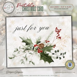 May include: A printable Christmas card with the text "just for you." The card features a watercolor design of holly leaves, red berries, and a pinecone. The card is A2 size, measuring 5.5" x 4.25", and fits an A2 size envelope.