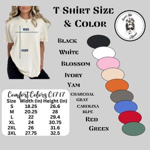 May include: Cream-colored t-shirt with size and color options. The image displays a woman wearing the shirt, with a size chart showing widths from 18.25 inches to 27.75 inches and heights from 26.6 inches to 32.5 inches. Colors include black, white, and red.