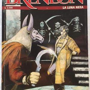May include: A comic book titled Brendon: La Luna Nera featuring a cover illustration of a person in a yellow coat facing a creature with a horned head holding a curved blade. In the background, three skeletal figures stand in the shadows.