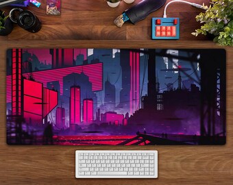Könnte beinhalten: Eine große Mauspad mit einem futuristischen Stadtbild-Design. Die Stadt ist in Schattierungen von Lila, Pink und Blau dargestellt, mit hohen Gebäuden und leuchtenden Lichtern. Die Mauspad ist perfekt für Gamer und alle, die ihrem Schreibtisch einen Hauch von Stil verleihen möchten.
