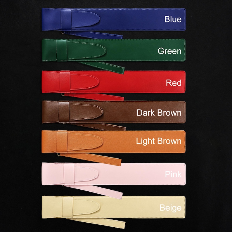 May include: A collection of colorful leather belts in various shades, including blue, green, red, dark brown, light brown, pink, and beige. Each belt features a matching buckle and strap, with the color names labeled on the image.