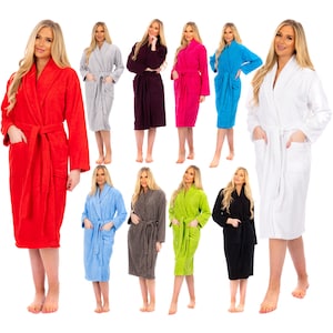 May include: A collection of ten bathrobes in various colours, including red, white, grey, black, blue, green, and pink. The robes are made of a soft, plush material and feature a shawl collar, long sleeves, and a tie belt.