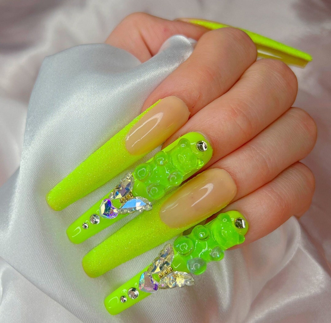 Platinum Level Nailz LLC - Animal Print Neon Green Extensions w/ rhinestones.  Contact 305.925.5650 or book online with link in bio We offer all types of  nail designs. No limit on nail