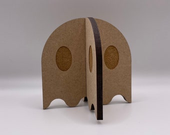 May include: A brown and black cardboard ghost shaped cutout with two round holes for eyes.