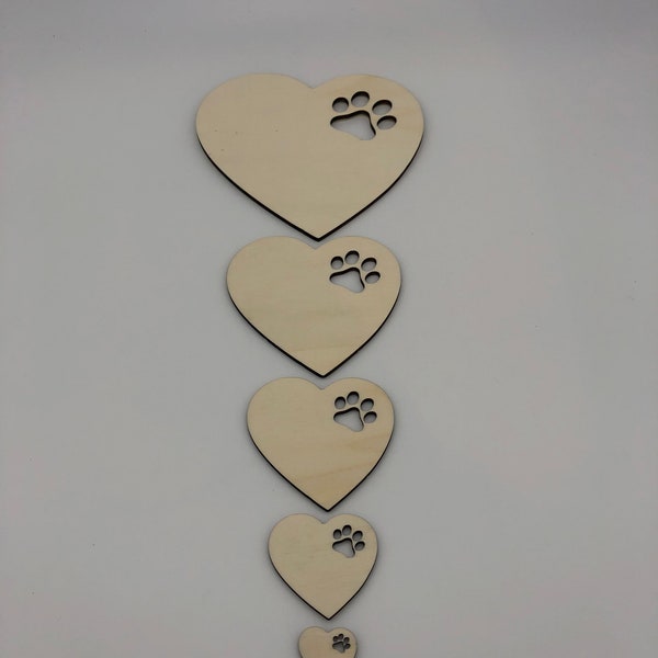 Wooden heart with cut out dog paw for your DIY project in different sizes