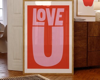 May include: A framed poster with the words "LOVE U" in bold, pink and red letters. The poster is in a wooden frame and is hanging on a wall.
