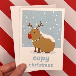 Leuke kerst! Kerstwenskaart capibara, blanco binnenkant