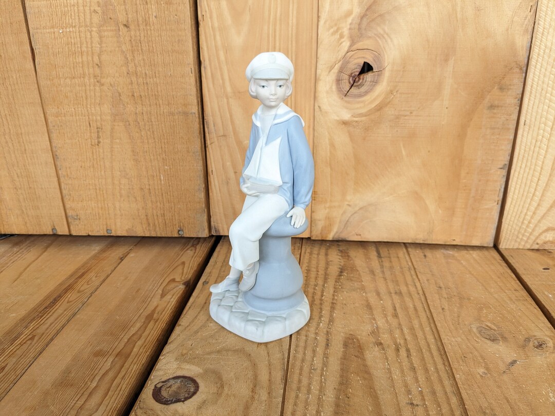 LLADRO Sailor Boy With Sailboat 4810 Retired. Matte Finish Porcelain