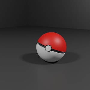 May include: A red and white Poke Ball toy. The ball is closed and the red half is facing the viewer.
