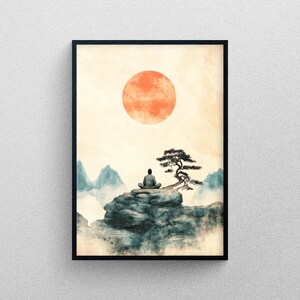 May include: A framed print of a watercolor painting depicting a person meditating on a rock with a large red sun in the sky and a small tree in the foreground.