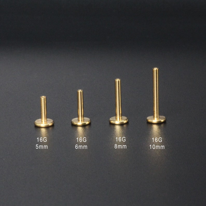 Puede incluir: Cuatro piezas de joyer&iacute;a corporal de acero quir&uacute;rgico de color dorado, cada una con una longitud diferente: 5 mm, 6 mm, 8 mm y 10 mm. La joyer&iacute;a est&aacute; etiquetada como 16G.