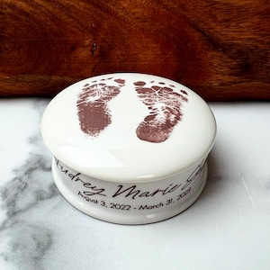 Custom urn for infant, stillborn, or child personalized with name, date and footprints