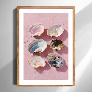 May include: A set of three ceramic mugs with a speckled, matte finish. The mugs are in shades of cream, light gray, and dark gray. Each mug has a simple, minimalist design, perfect for coffee or tea.