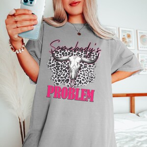 oversized morgan wallen t shirt dress Wear our Morgan Wallen shirt as a t-shirt dress and pair it with some tall boots. Such a fun concert outfit! #westernfashion #westernboutique #western #utahboutique #westernstyle #boutique #utah #fyp