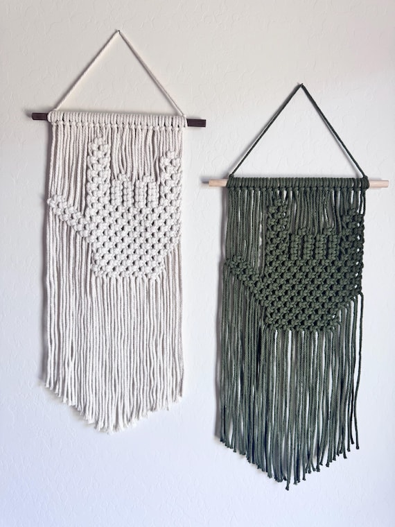 Macrame that doubles as advocacy art — the ASL 'I Love You' handshape woven into fiber art is a genuinely clever concept you won't find at HomeGoods.