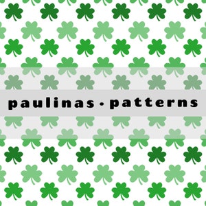 May include: A seamless pattern featuring a repeating design of green four-leaf clovers on a white background. The text "paulinas - patterns" appears in black at the bottom of the image.
