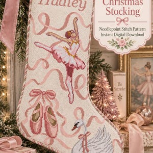 May include: A needlepoint Christmas stocking featuring the name Hadley, a ballerina in a pink tutu, pink ballet slippers, and a white swan. The design includes pink ribbons on a cream background with a twisted pink and white cord trim edge.