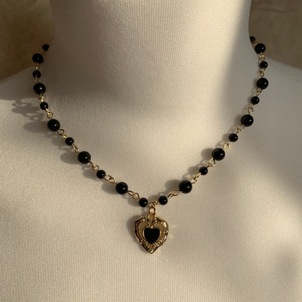 Grunge solid necklace with a gold heart, onyx stones, gold-plated stainless steel, gold-plated sterling silver.