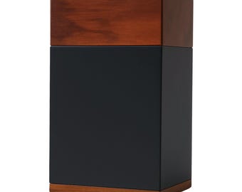 May include: A rectangular box with a dark blue body and a wooden top and bottom. The top and bottom are a warm brown color, contrasting with the blue. The box has a clean, modern design.