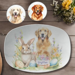 May include: A white oval serving platter with a watercolor design of a brown bunny rabbit, a golden retriever dog holding a basket of colorful Easter eggs, and spring flowers. The text "Gryffen" is printed on the platter.