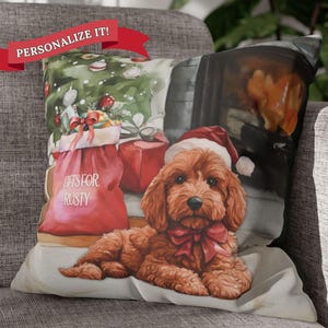 May include: A throw pillow with a Christmas-themed design featuring a brown dog wearing a Santa hat and a red bow. The dog is lying in front of a fireplace and a Christmas tree. The text "Gifts for Rusty" is on a red bag.
