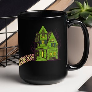 Horror in Oz Black Glossy Mug, Wonderful Wizard of Oz characters trick or treat in horror costumes, Emerald City is a haunted house image 3