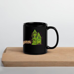 Horror in Oz Black Glossy Mug, Wonderful Wizard of Oz characters trick or treat in horror costumes, Emerald City is a haunted house image 7