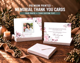 May include: A stack of memorial thank you cards featuring a white background with pink and grey floral accents. One card displays a square photo of a person, the name Vivian Chen, and the text Thank you. A stack of white envelopes sits in the foreground.