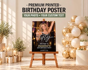 May include: A rectangular birthday poster on a wooden easel featuring a photo of a person holding a champagne glass. The text reads: Hello Fifty, Welcome to Jasmine's 50th Birthday Party, November 12, 2026. The poster is surrounded by gold and white balloons.