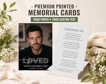 May include: A stack of rectangular memorial cards featuring a portrait of a man, the text "LOVED forever", the name "DAVID EDWARD LAINE", and dates "11.12.1980 - 02.01.2026". The reverse side displays the poem "REMEMBER ME" in black serif font.