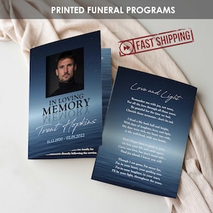 May include: Funeral program with a photo of a man, the text "IN LOVING MEMORY" and the name "Trent Hopkins". The program is open, revealing a poem titled "Love and Light" on a blue background. The words "PRINTED FUNERAL PROGRAMS" are at the top.