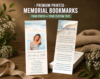 May include: Two rectangular memorial bookmarks featuring a beach scene at the top. One bookmark displays a photograph of a person, the text "IN LOVING MEMORY OF Amanda W. Sifta 11-12-1970 - 02-01-2022" and a poem. The other shows "CELEBRATE My Life" and a poem.