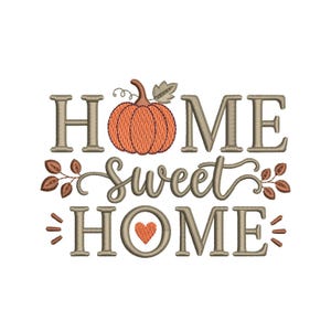 May include: An embroidery design featuring the text HOME SWEET HOME in a tan serif font. The letter O in the first HOME is replaced by an orange pumpkin with a green leaf. A small orange heart replaces the O in the second HOME.