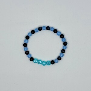 Pulsera de cristal FOMO / Miedo a perderse / Calcedonia azul y ojo de gato azul